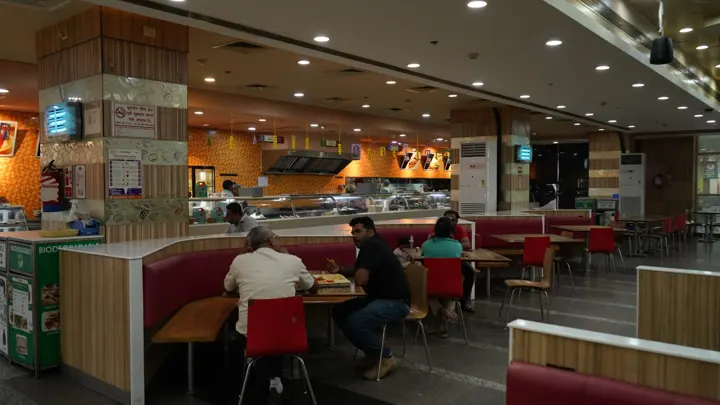 Food court dining area and kiosks at MSX Mall, Greater Noida