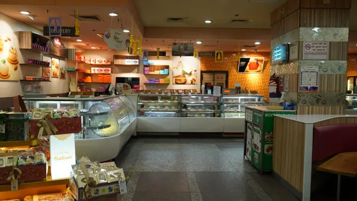 Food court dining area and kiosks at MSX Mall, Greater Noida