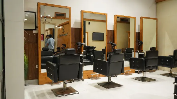 Salon interior with styling stations at MSX Mall, Greater Noida
